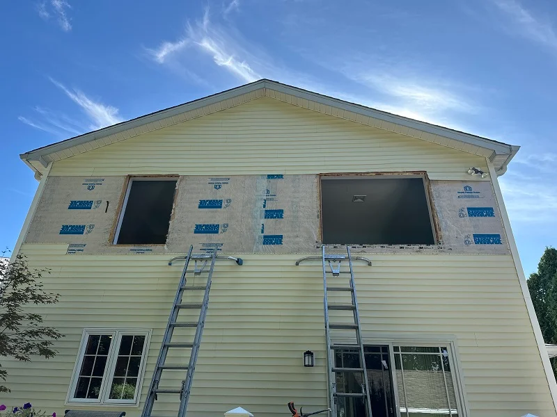 Removal of vinyl siding so we can install new windows